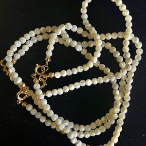 Strands of Mother -of -Pearl Beads , About 2 MM and clasped